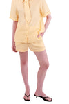 Shorts amarelo linho